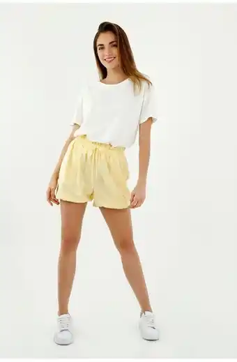 Tennis Short de mujer, silueta amplia de tiro alto, con efecto bombacho, color amarillo oferta