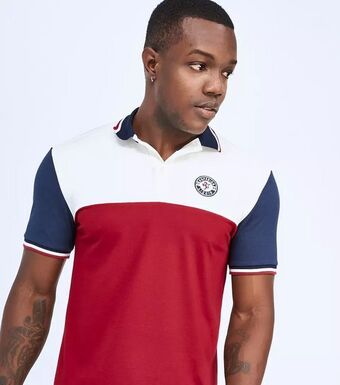 Stirpe Polo con cortes, bordada punto corazon oferta