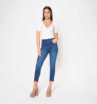 Studio F Jean skinny tiro alto ruedo irregular oferta