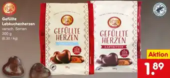 Netto Marken-Discount SANTA CLAUS TOWN Gefüllte Lebkuchenherzen 300 g Angebot