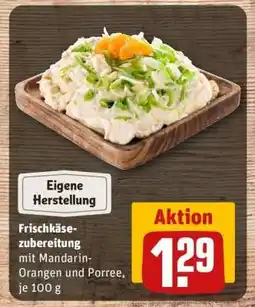 REWE Frischkäsezubereitung mit Mandarin-Orangen und Porree, je 100 g Angebot