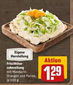 REWE Frischkäsezubereitung mit Mandarin-Orangen und Porree, je 100 g Angebot