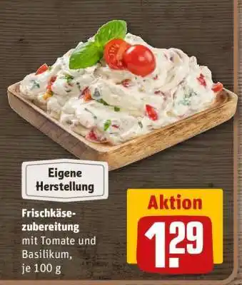 REWE Frischkäsezubereitung mit Tomate und Basilikum, je 100 g Angebot
