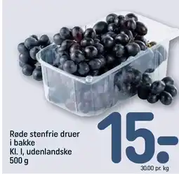 Røde stenfrie druer i bakke