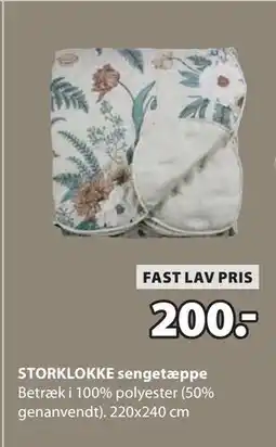JYSK STORKLOKKE sengetæppe tilbud