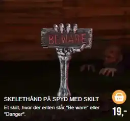 Harald Nyborg Skelethånd på spyd med skilt tilbud