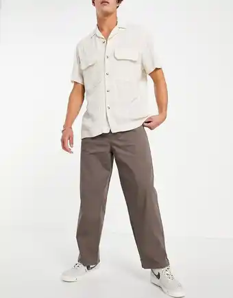 Asos ASOS DESIGN - Lysebrune bukser med vide ben og plisseringer tilbud