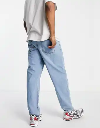 Asos ASOS DESIGN - Baggy jeans i lys stenvask-Blå tilbud