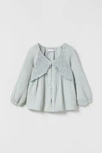 ZARA Blusa estructura blonda oferta