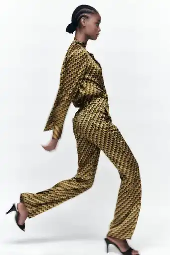 ZARA Pantalón flare estampado oferta