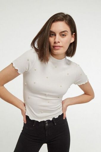 Koaj Camiseta femenina unicolor con perlas sobre frente y mangas. oferta