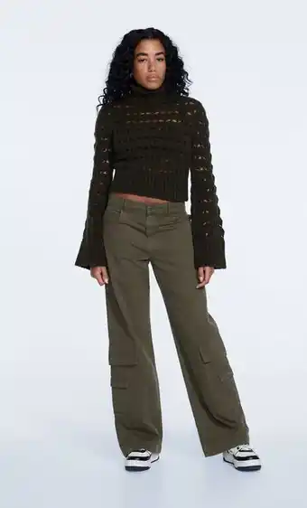 Stradivarius Open knit jumper with bell sleeves offer