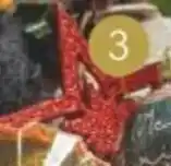Tesco Stars Selected From The Red Decorations 100-pack offer