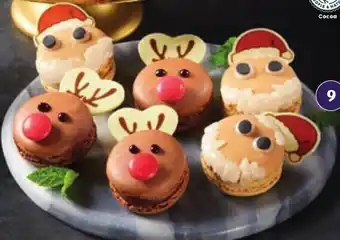Aldi Create your own macarons choose from 6 chocolate reindeer or 6 vanilla santas 105g/106g offer