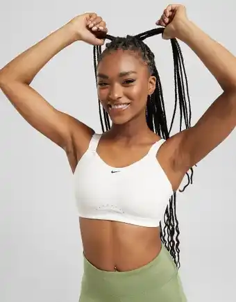 JD Sports Nike training alpha bra - white - womens offer
