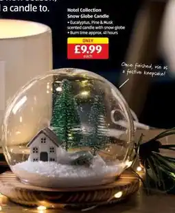 Aldi Hotel Collection Snow Globe Candle offer
