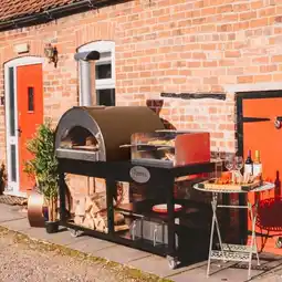 Costco Alpha Pro Grande Fumoso Wood-Fired Pizza Oven and BBQ Grill Bundle in 4 Colours + Cover offer