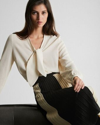 Trucco Blusa lazo en cuello oferta