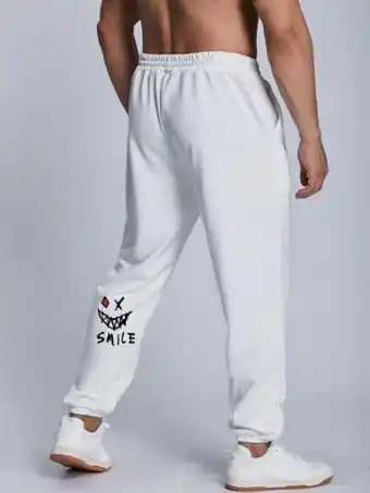 Shein Extended sizes hombres pantalones deportivos con estampado de dibujos animados y letra de cintura con cordón oferta