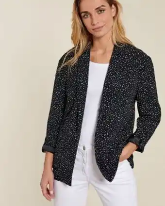 Veste souple à pois.