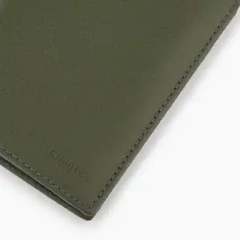 Portefeuille moyen modÚle zippé 2 volets charles en cuir grainé