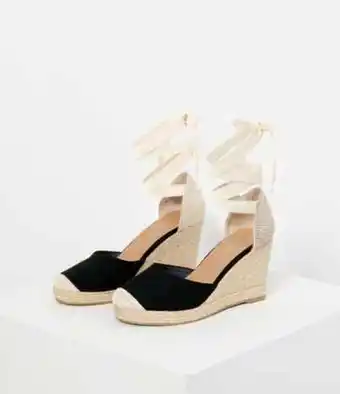 Sandales compensées bicolores