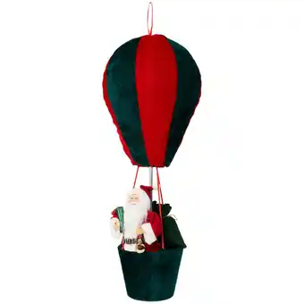 Personnages de noël dans une montgolfière