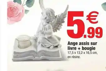Ange assis sur livre + bougie