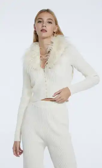 Veste en maille et fausse fourrure