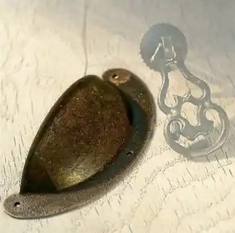 Poignée coquille métal effet rouille clava entraxe 90 mm