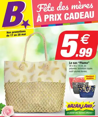 Le sac "Pluma" 38 x 38 x 14 cm, en polyester, fermeture zippée, motif plumes dorées.