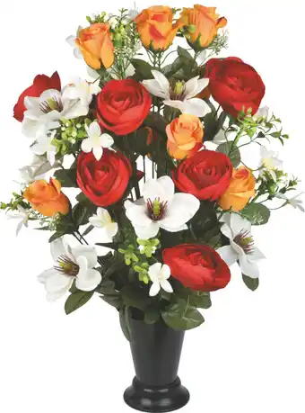 Le cône de roses, renoncules et magnolias