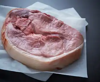 Auchan Supermarché Sans marque porc : rouelle jambon offre