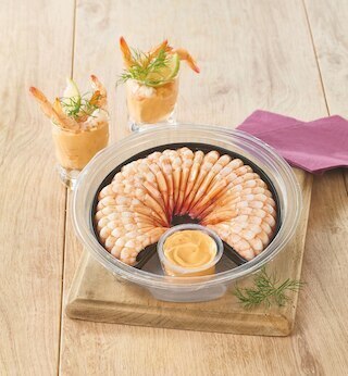 U Express COURONNE DE QUEUES DE CREVETTES SAUCE COCKTAIL OU FINES HERBES offre