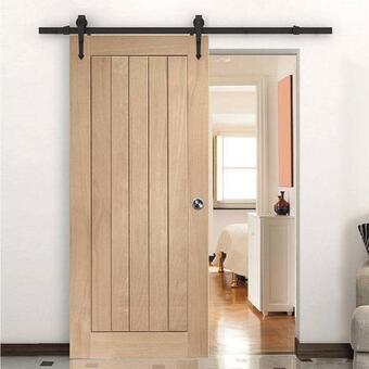 Brico Dépôt Goodhome porte coulissante bois "cottage" haut. 204 cm x larg. 83 cm x ep. 35 mm. offre