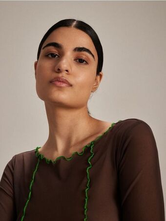 Reserved Slim fit hosszú ujjú blúz ajánlat