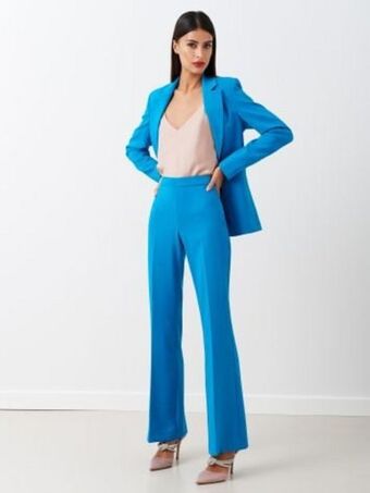Rinascimento Pantaloni mid flared in tessuto tecnico color blu ottanio offerta