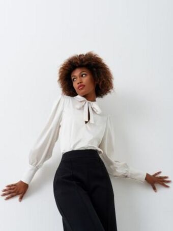 Blusa con fiocco