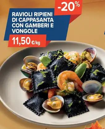 Ravioli ripieni di cappasanta con gamberi e vongole