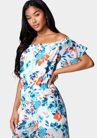 Bebe Printed off shoulder slit leg jumpsuit oferta