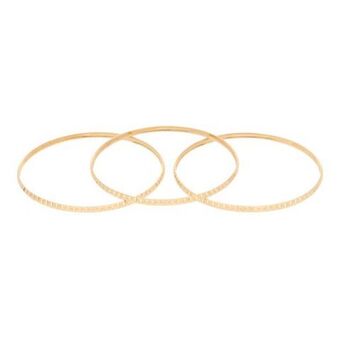 Nacional Monte de Piedad Tres pulseras de arillo labradas en oro amarillo 14 kilates. oferta