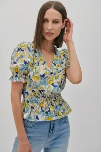 Blusa floral detalles enresortados