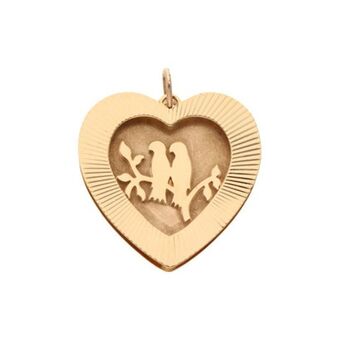 Nacional Monte de Piedad Dije estriado motivo corazón en oro amarillo 12 kilates. oferta