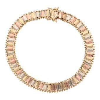 Pulsera boleada en oro tres tonos 14 kilates.