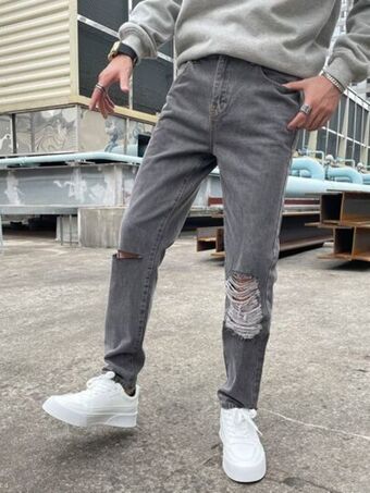 SHEIN Hombres jeans rotos con bolsillo oblicuo oferta