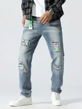SHEIN Hombres jeans rotos con estampado de dibujo oferta
