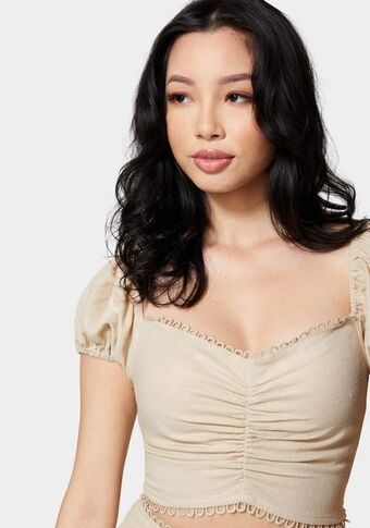 Bebe Metallic linen off shoulder blouse oferta