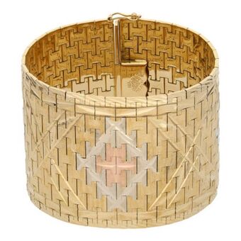 Nacional Monte de Piedad Brazalete eslabón articulado en oro tres tonos 18 kilates. oferta