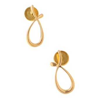 Nacional Monte de Piedad Broqueles estilizados firma tane en oro amarillo 18 kilates. oferta