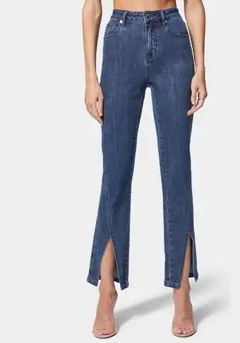 Bebe Slit hem slim jean oferta